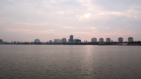 peaceful-shot-of-the-city-over-the-lake