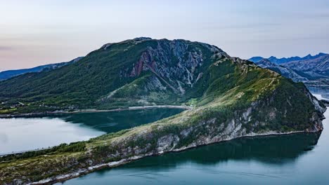 Calm,-mirrorlike-waters-of-Beiar-fjord,-near-Bodo,-Norway