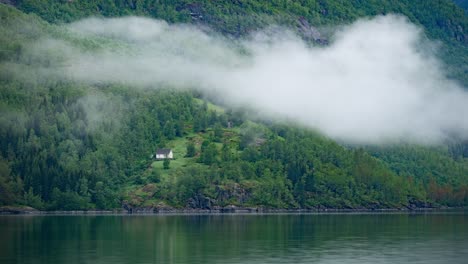 Clouds-forming-over-the-fjord-on-a-summer-morning