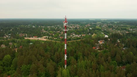 4k-Aerial-Footage-Telecommunication-Tower-with-antennae-for-cell-phone,-radio-transmitters
