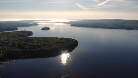 Beautiful-view-of-Lake-Wallenpaupack-Pennsylvania-in-the-morning-looking-out-across-tranquil-water-and-forest