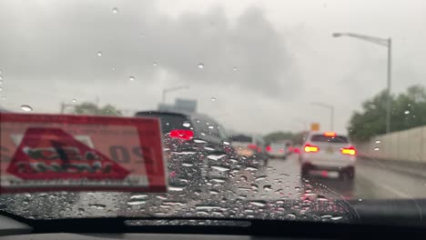 Sitting-in-traffic-on-a-rainy-day-with-the-windshield-wipers-on