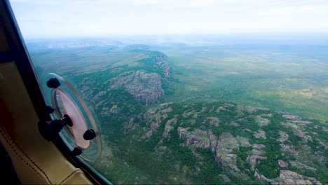 POV-from-light-aircraft-flying-over-Kakadu-National-Park-showing-rugged-landscape