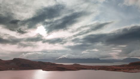 Dark-gloomy-clouds-rolling-above-the-sea-and-the-Skjekvoja-island