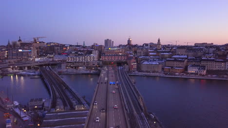 Stockholm-south-bridge-drone-flyover-view-at-evening-time