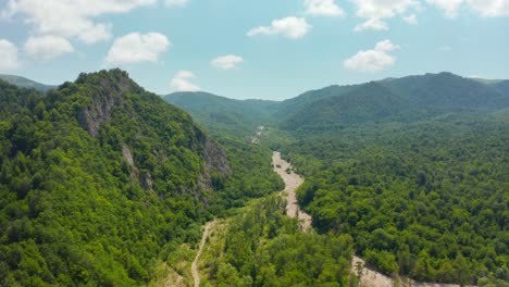 Aerial-view-of-wild-green-forested-mountains-and-cliffs-in-Kakheti-region-in-Georgia