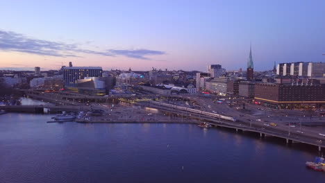 Stockholm-downtown-drone-flyover-view-at-evening-time