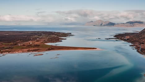Aerial-view-of-the-fjord-and-small-villages-on-the-shore-in-the-Stronstad-region,-Nordland,-Lofoten