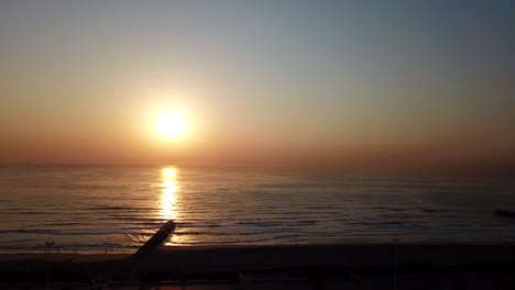 Beautiful-sunrise-drone-aerial-footage-of-Durban-beach,-South-Africa