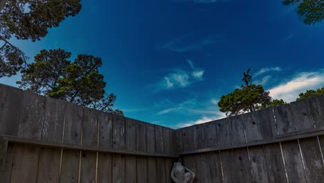 Backyard-time-lapse-of-blue-skies-with-slight-clouds