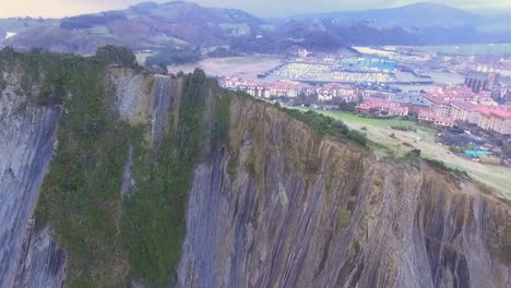 zumaia-appearing-behind-the-cliff-and-the-flysch-seen-from-above