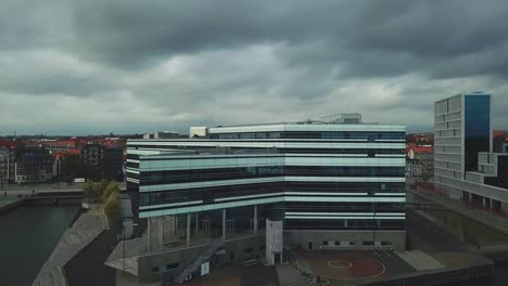 Drone-footage-of-building-in-Aarhus,-Denmark