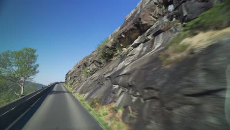 A-drive-on-the-narrow-mountain-road-near-Fossmork,-Norway