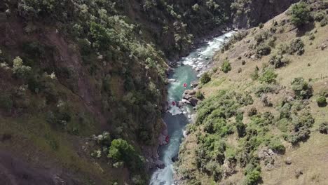 Tourists-on-a-white-water-river-rafting-adventure-in-New-Zealand---aerial