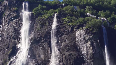 Three-of-the-seven-streams-of-the-Seven-Sisters-waterfall-in-Geiranger-fjord,-Norway