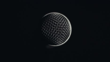 Lighty-slowly-rotating-around-microphone-in-complete-darkness