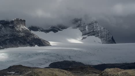 Thick-low-clouds-casting-shadows-on-the-brilliant-white-of-the-glacier