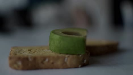 Making-an-avocado-toast-with-big-avocado-slices