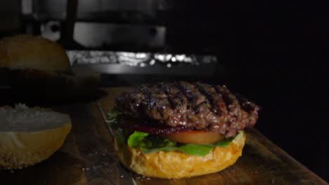 Slow-motion-shot-of-preparing-a-fresh-burger-at-home
