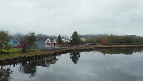 Small-factory-by-the-foggy-lake-near-industrial-town
