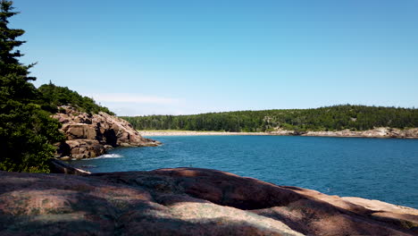 View-of-Sand-Beach-in-Acadia-National-Park,-Maine,-USA,-static-shot-from-large-rock