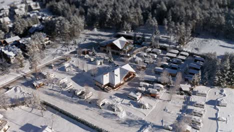 Aerial-view-of-the-Al-Plan-camping-in-San-Vigilio-di-Marebbe,-Soth-Tirol,-Italy,-in-winter