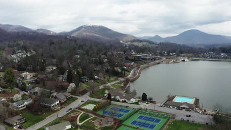 Aerial-view-of-small-town-and-Great-Smoky-Mountain-in-distance