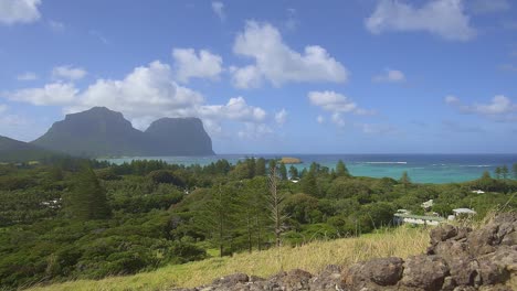 Looking-out-over-Lord-Howe-Island-on-a-sunny-windy-day-with-Mt-Lidgbird-and-Mt-Gower-in-the-background