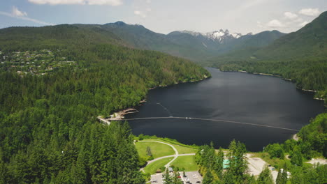 Aerial-drone-view-over-picturesque-Capilano-Lake-in-North-Vancouver,-British-Columbia