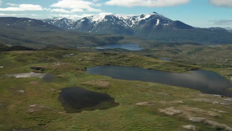 A-flight-above-the-Korgfjellet-mountain-range,-Norway