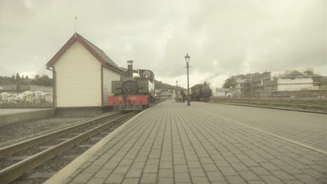 On-a-cloudy-day,-a-steam-engine-that-inspired-Thomas-the-Tank-Engine-arrives-at-the-train-station