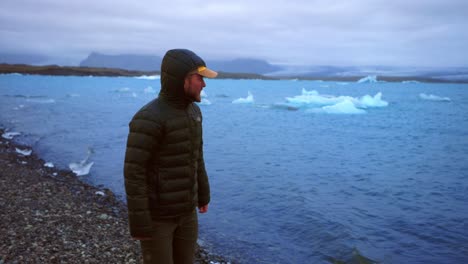 Man-Travelling-Along-Jokulsarlon-Glacial-Lagoon