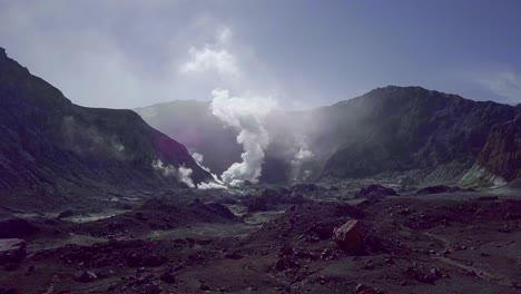 White-Island-Whakaari-crater-with-toxic-smoke-and-ruinous-terrain,-aerial-sci-fi
