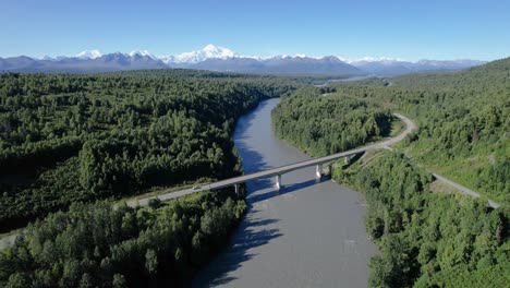 Cars-driving-over-Chulitna-river-bridge-on-George-Parks-highway-Alaska