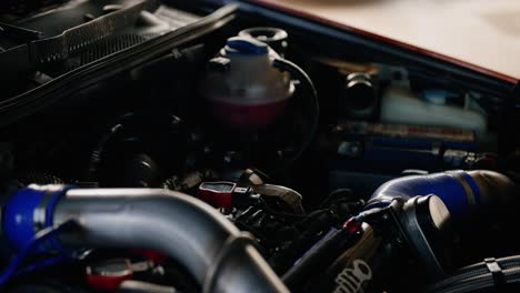 A-slow-motion-parallax-shot-of-the-engine-hood-of-a-tuning-car