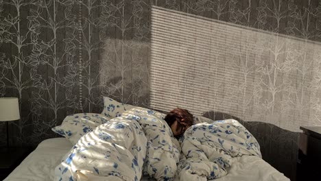 Woman-sleeping-in-white-cozy-bed-while-sunlight-moves,-time-lapse-shot