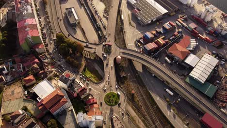 Aerial-Birdseye-view-above-Vigo-spain-highway-roundabout-flyover-traffic-turning-below
