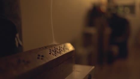 Relaxing-Mood-With-Burning-Incense-Inside-A-Vintage-Metal-Case
