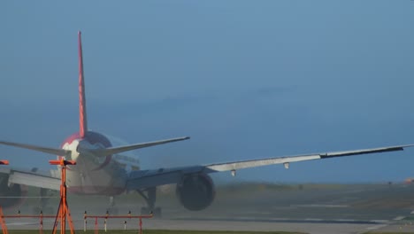 Engine-Jet-Blast-of-an-Aircraft-Taking-Off-from-the-Runway,-Rear