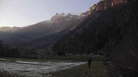 Commute-cycling-exploration-of-Swiss-alps-at-sunset-time