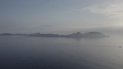 Cies-Islands-With-Fog-In-Galicia,-Spain---aerial-drone-shot