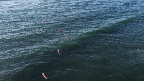 Aerial-of-surfers-waiting-for-waves-in-Sayulita-main-beach-in-Mexico
