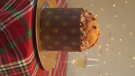 Traditional-Christmas-Italian-Panettone-and-champagne,-festive-bread