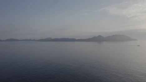 Sunrise-View-Of-Cies-Islands-In-Fog-Off-The-Coast-Of-Pontevedra-In-Galicia,-Spain