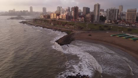 Slow-motion-shot-of-the-foggy-sunrise-at-the-city-beach-of-Mar-del-Plata,-Argentina