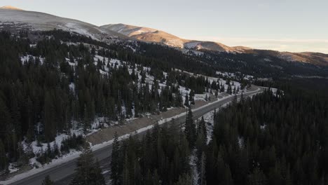 Aerial-footage-panning-along-Highway-9-at-sunset-with-Mount-Silverheels-in-the-distance