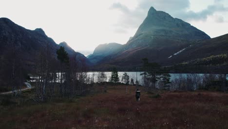 women-running-towards-a-mountain-in-Norway