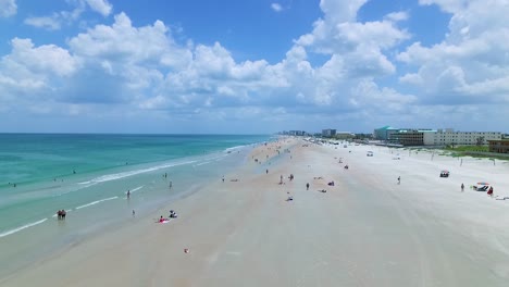 Aerial-of-a-tourist-filled-beach-in-Orlando,-Florida