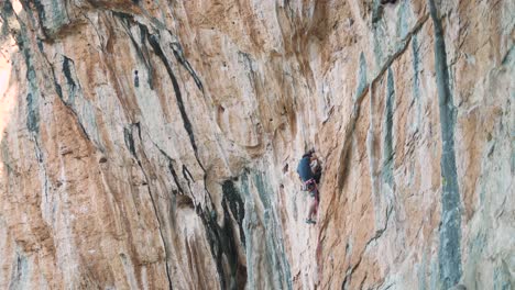Sport-climbing-on-a-vertical-mountain-wall