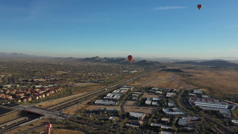 Hot-air-balloon-launch-over-a-desert-city